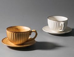 Artisan Stoneware Cup & Saucer – Vintage Sunburst Design