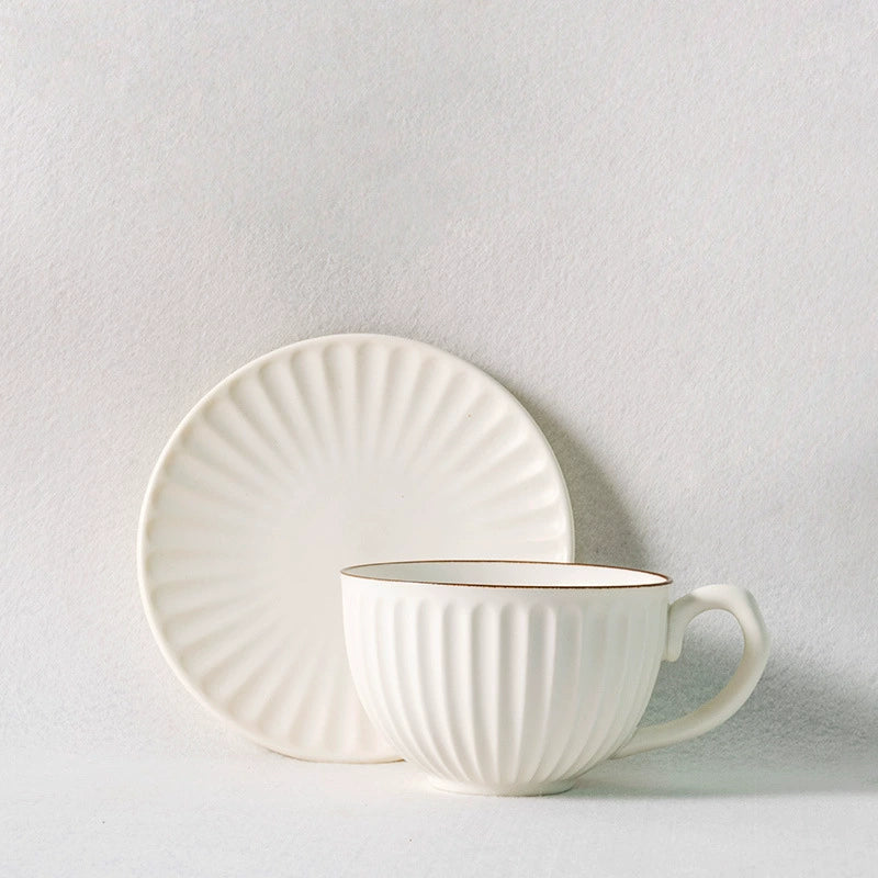 Artisan Stoneware Cup & Saucer – Vintage Sunburst Design